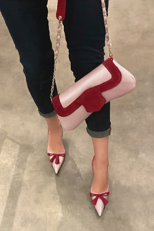 Powder pink and cardinal red women's open arch dress pumps. Pointed toe. High slim heel. Worn view - Florence KOOIJMAN